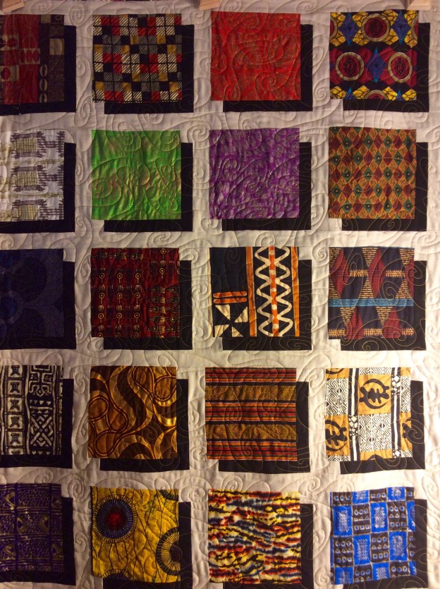 African Windows (2014). Pieced by Tierney Davis Hogan, quilted by Betty Anne Guadalupe.