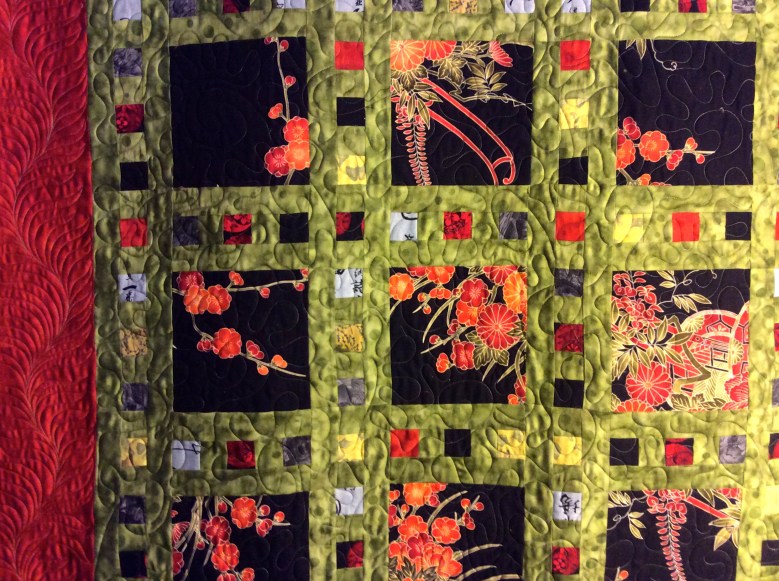 Asian Fabric Slideshow - pieced by T. Hogan, long arm quilting by BA Guadalupe