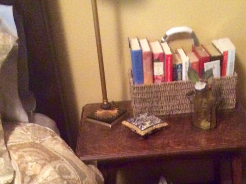 On the bedside table in the guest room